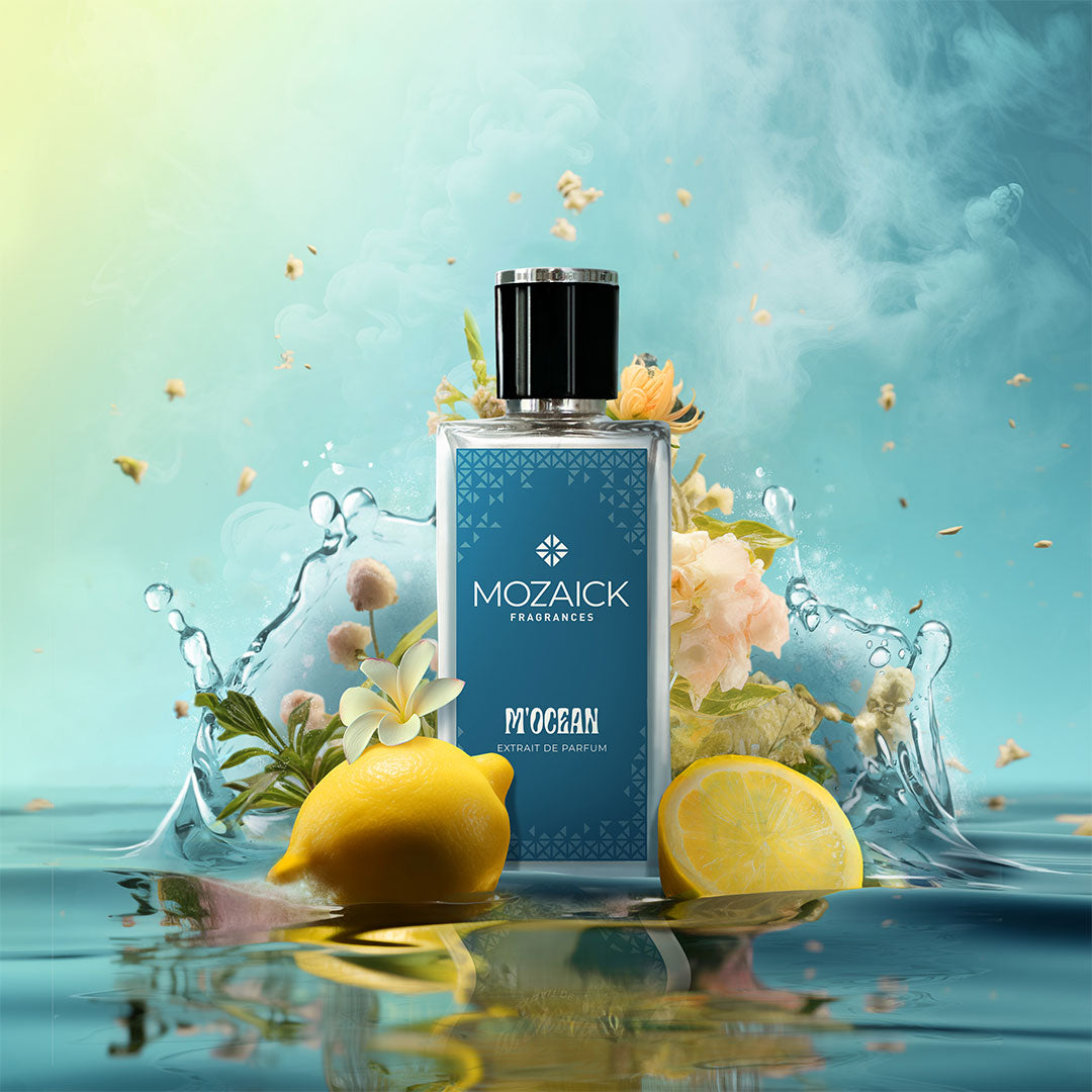 M'OCEAN Extrait de Parfum 50 ml by MOZAICK – bottle in water with lemons and flowers on a turquoise background